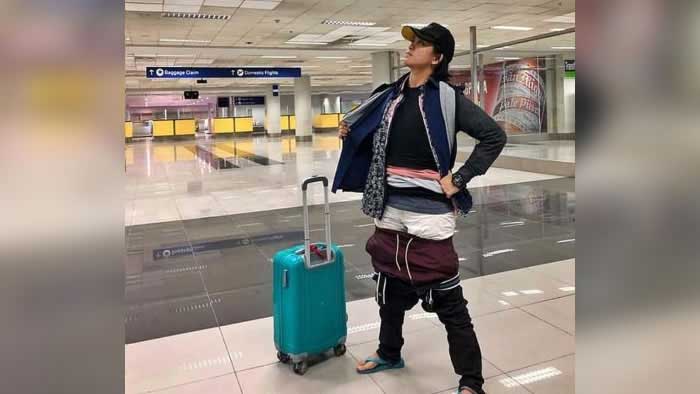 Para não pagar a taxa por excesso de peso da bagagem, uma passageira nas Filipinas resolveu vestir várias peças de roupa.