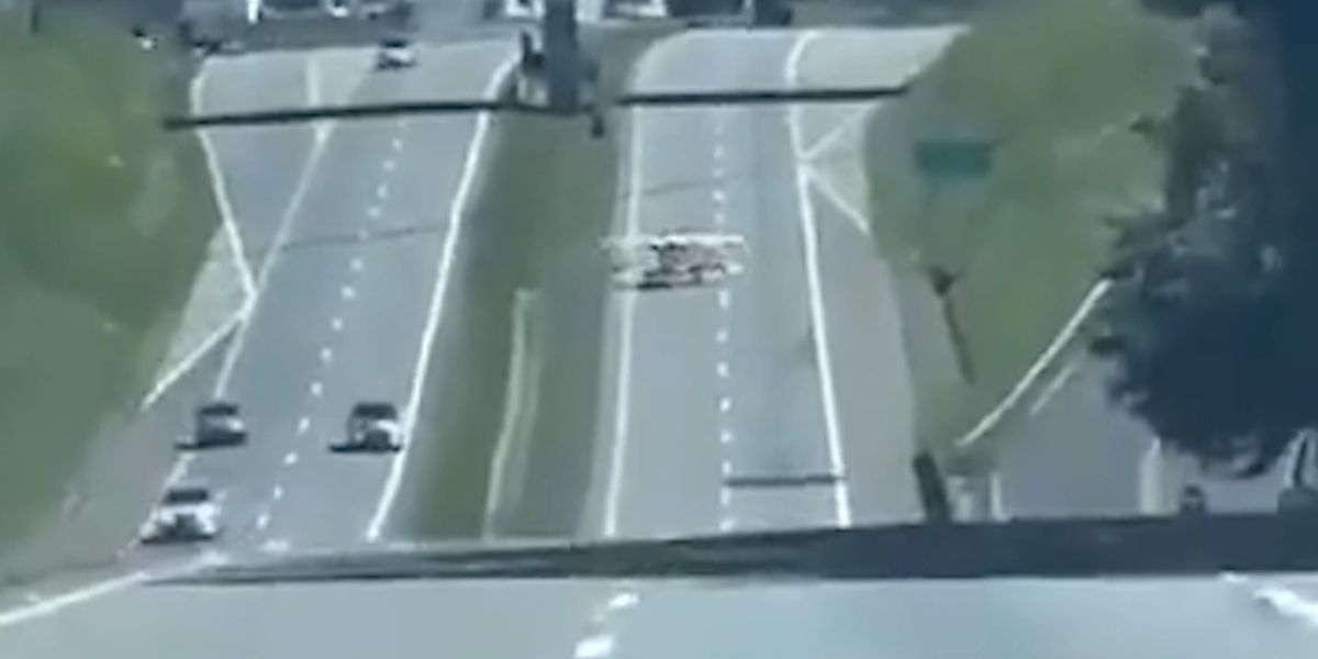 Tense video: small plane makes emergency landing on highway