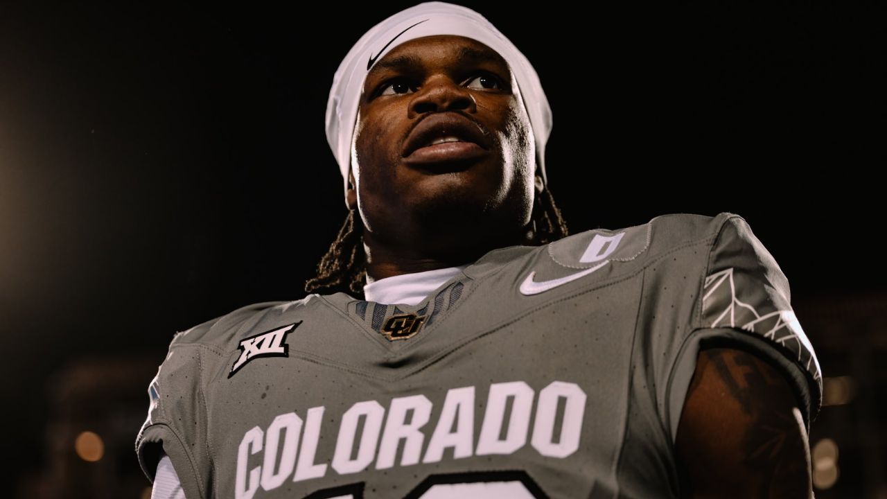 Passenger surprised to be seated next to football player Travis Hunter