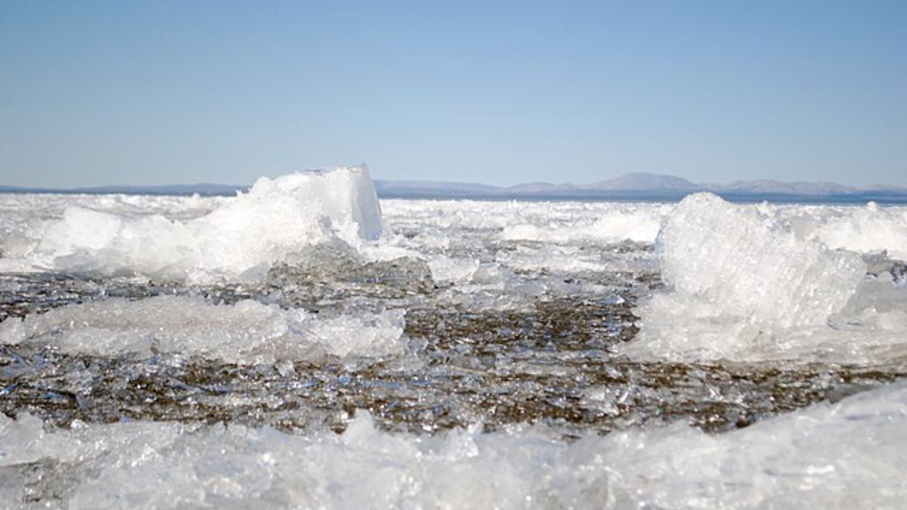 Three men fell into a frozen lake in Alaska while riding snowmobiles and an ATV