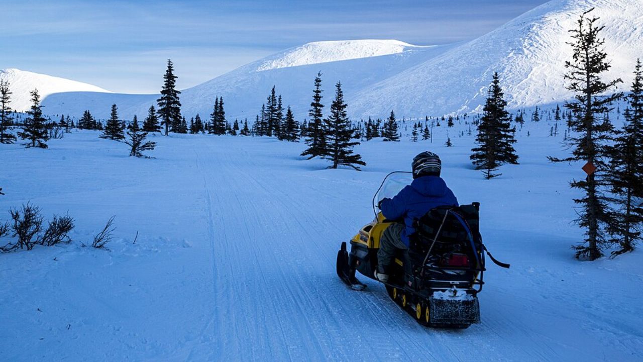 Three men fell into a frozen lake in Alaska while riding snowmobiles and an ATV